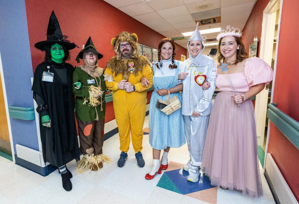 From left are Department of Pediatrics team members Katie Sanders, associate director of administration and finance Selena Daniel, associate director of administration and finance; Jason Dill, director of budget and finance; Dr. Mary Taylor, Suzan B. Thames Chair and professor of pediatrics; Shannon Hoover, associate director of administration and finance; and Whitney Bondurant, business administrator.